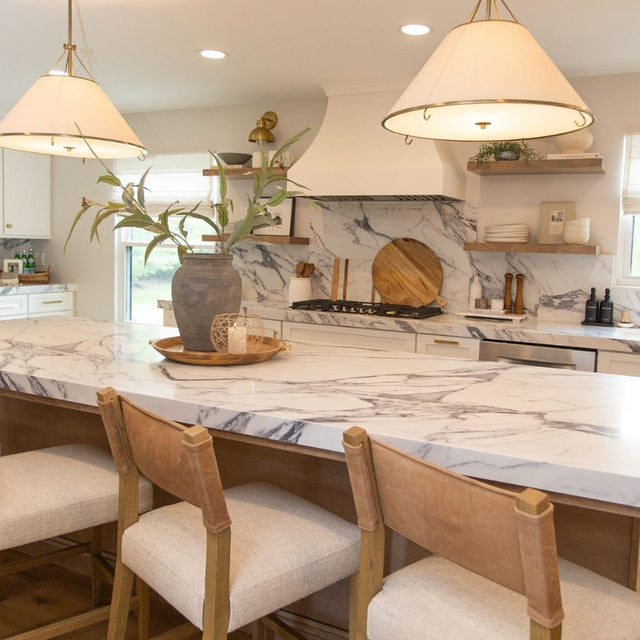 3 piece gold hollow out iron candle holder set in the dining room