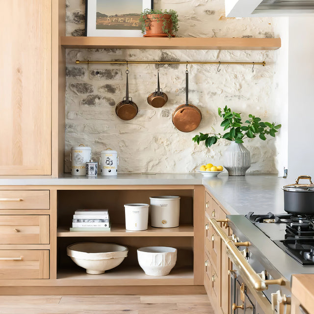 3 piece iron food storage jar with handles on the cabinet