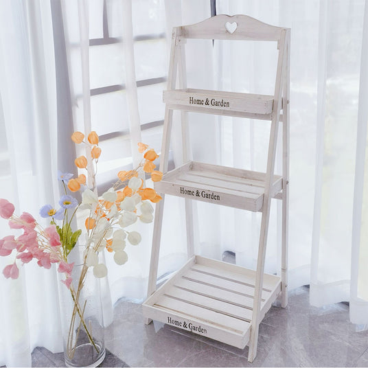 3 tier ladder-style wooden flower plant stand in the room