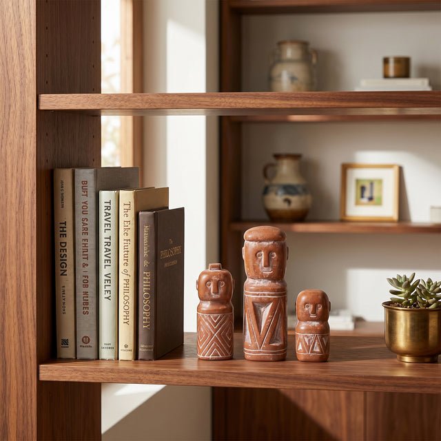 Abstract Figure Set On Wooden Bookshelf
