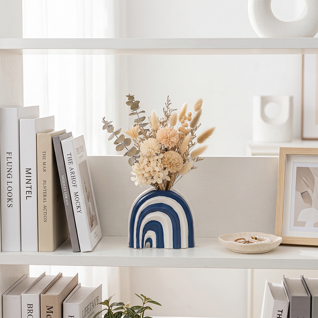 Arch vase decoration on book shelf