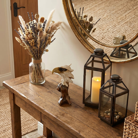 Bald eagle figurine on rustic entry wood table