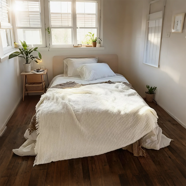 Beige and brown throw blankets on bed