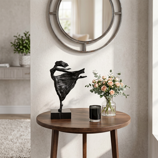Black dancer statue on entry round table