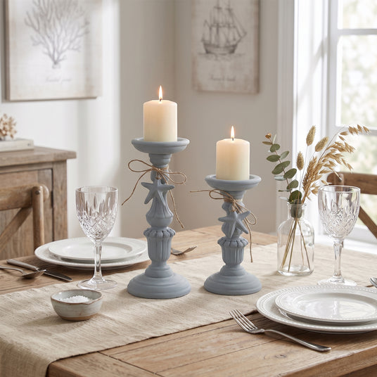 Blue Candle Holder Set On Wooden Table