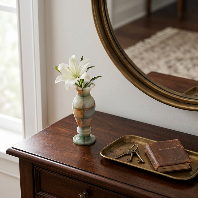 Blue vein stone vase on rustic entry console table