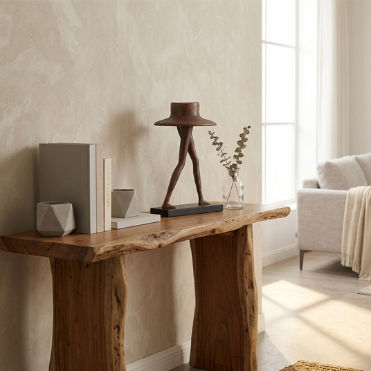Brown hat figurine on naturaledge wood console