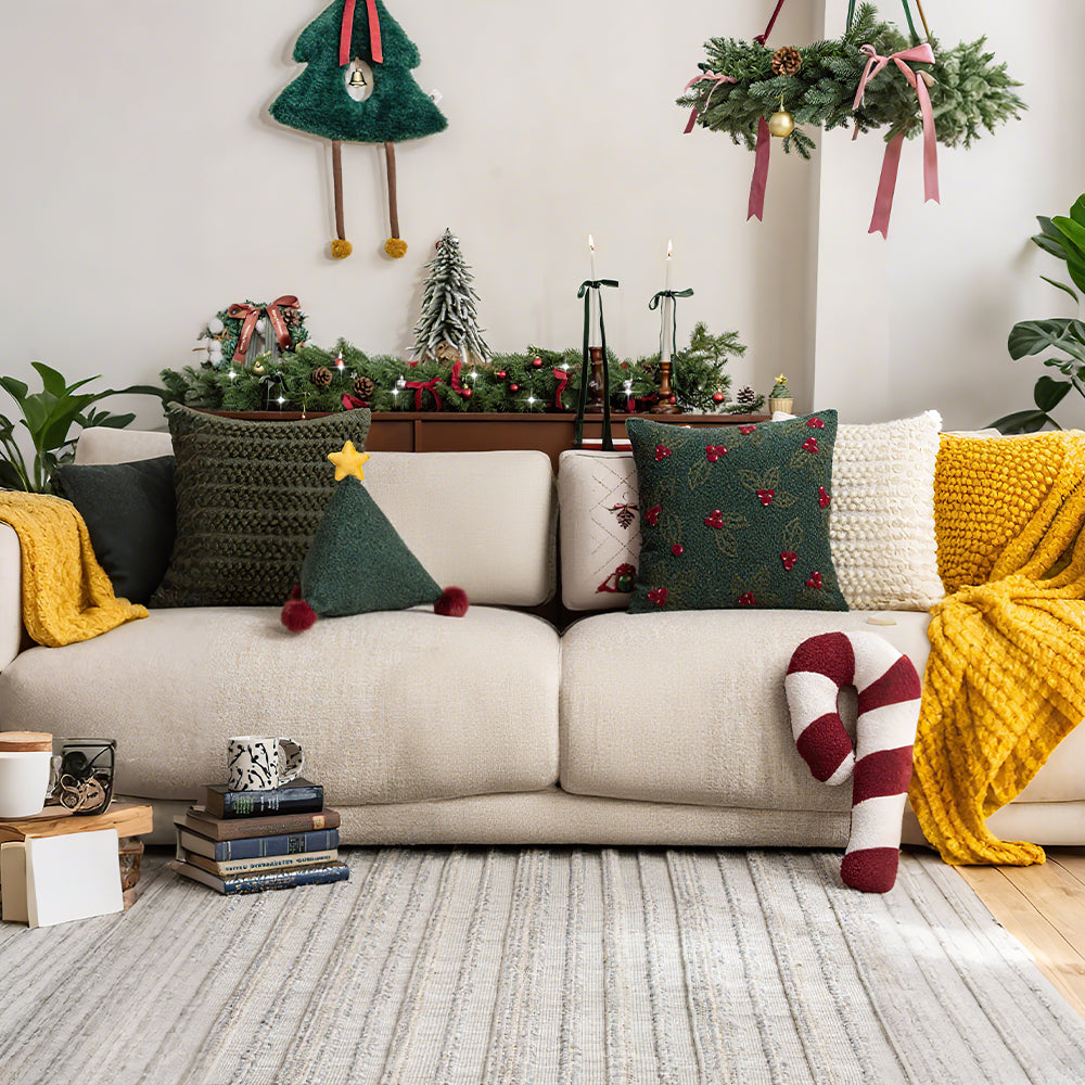 Christmas Triangular Shaped Throw Pillow with Pom Poms Besides The Green Pillow 081443