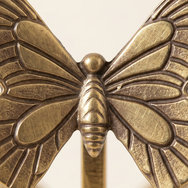 Closeup carved butterfly metal detail