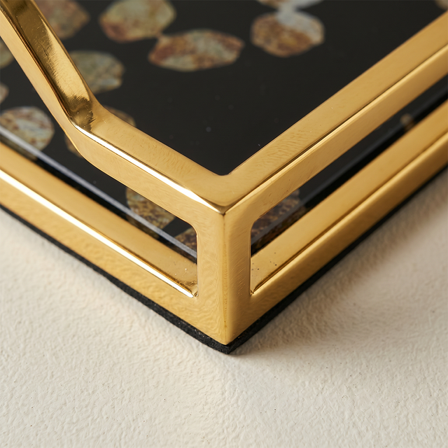Closeup gold edged glass tray
