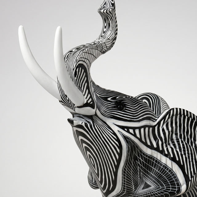 Closeup head shot white tusk elephant sculpture