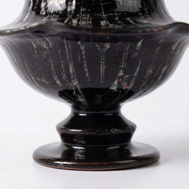 Closeup textured speckled vase body