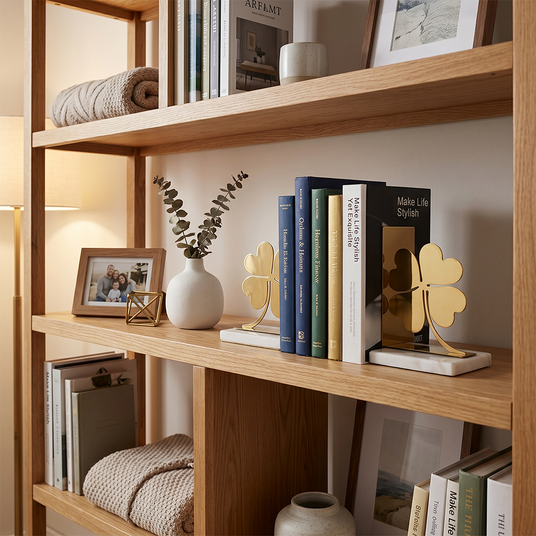 Clover bookends on wood book shelf