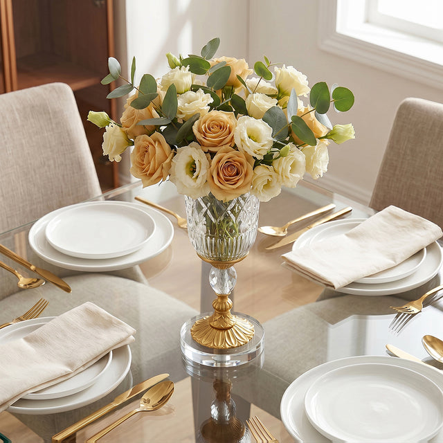 Crystal gilded vase set on dinner tabletop