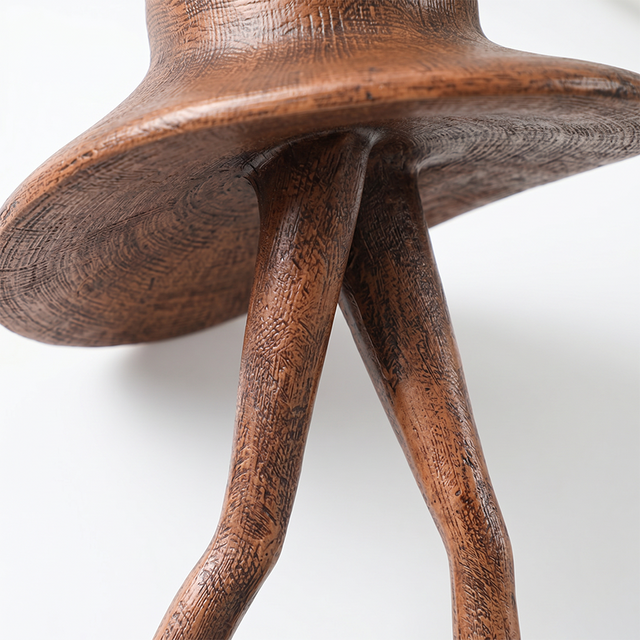 Detailed crossed legs hat statue shot
