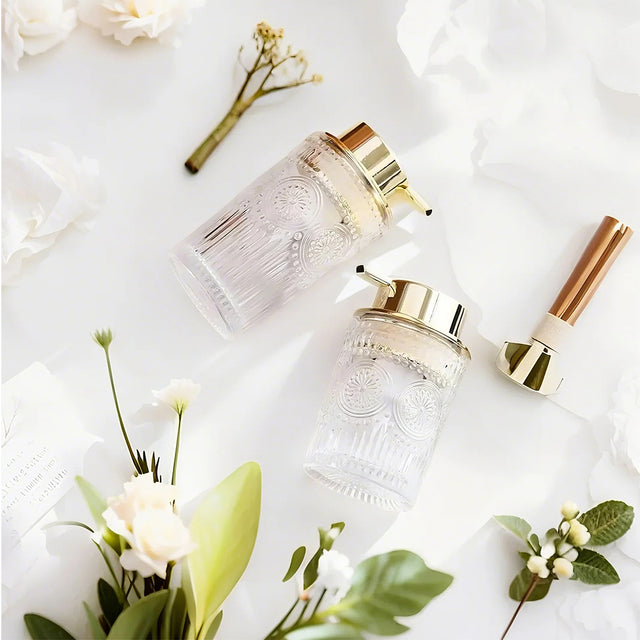 Glass Bathroom Dispenser Set on the table