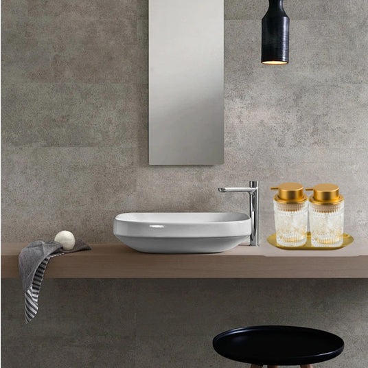 Glass Bathroom Dispenser Set on the table