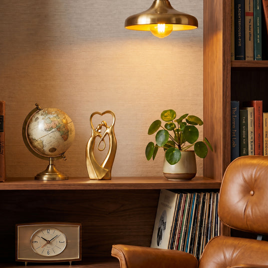 Gold Couple Sculpture On Bookshelf