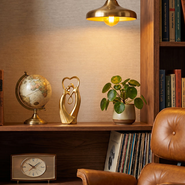 Gold Couple Sculpture On Bookshelf