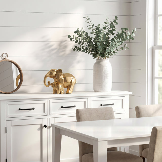 Gold Elephant Decor On White Cabinet