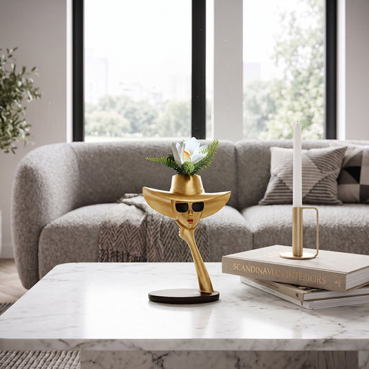 Gold Face Vase On Marble Table
