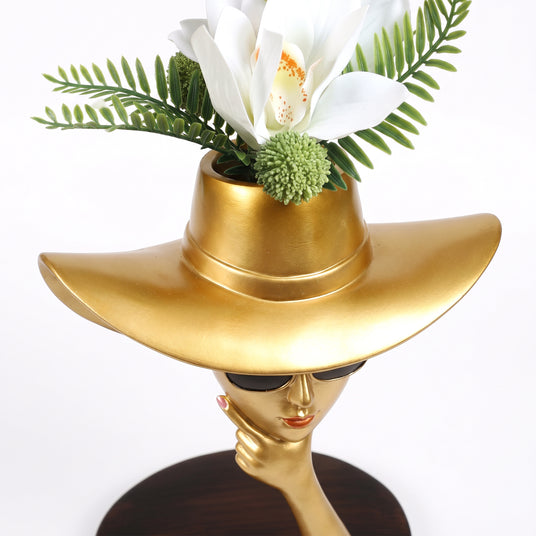 Gold Hat Vase And Face Close Up