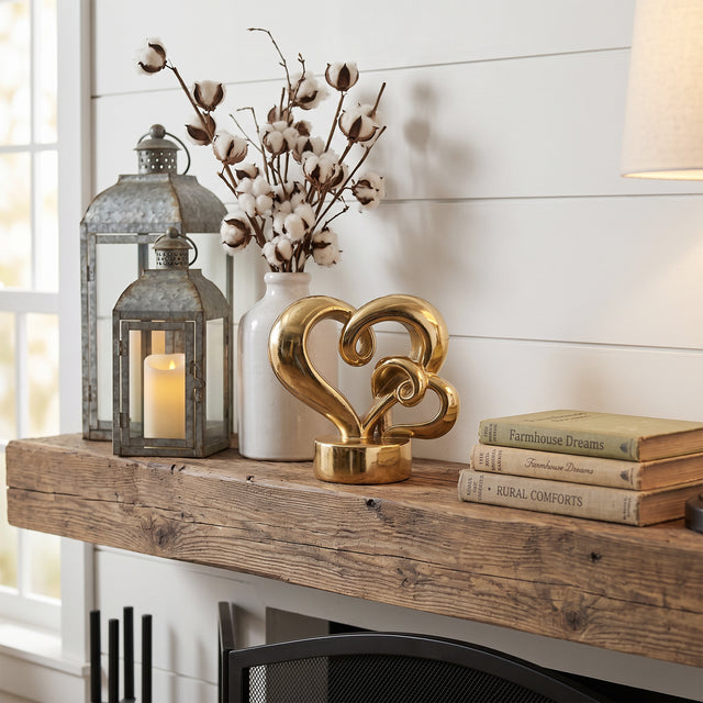 Gold Heart Sculpture On Rustic Wood Shelf