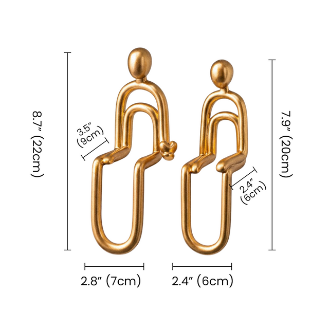 Golden sitting figurines