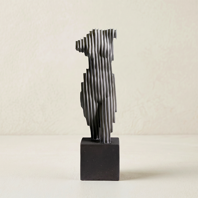 Gray ribbed torso statue square base