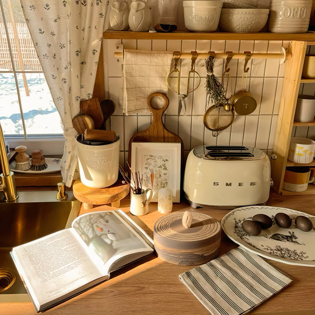 Handmade Stoneware Tea Caddy Storage Canister with Lid and Rope Handle on the Table