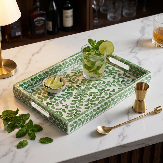 Leaf print tray with drinks on marble counter