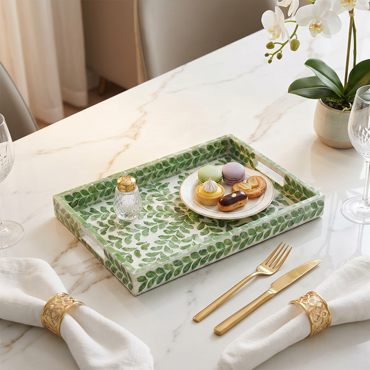 Leaf tray with desserts on dining table