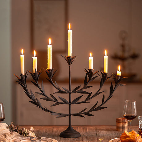 Metal Tabletop Olive Branches Candelabra on a wooden table