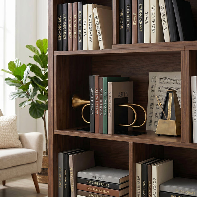 Musical bookend set inside open living bookshelf