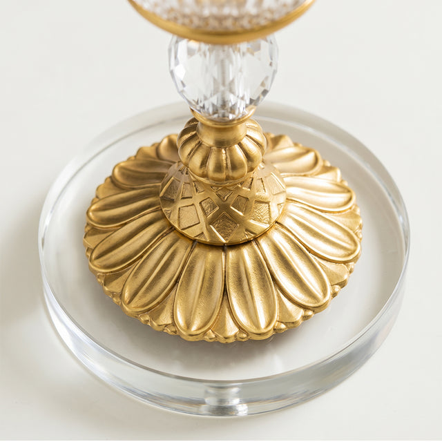 Ornate gold fluted vase base detail