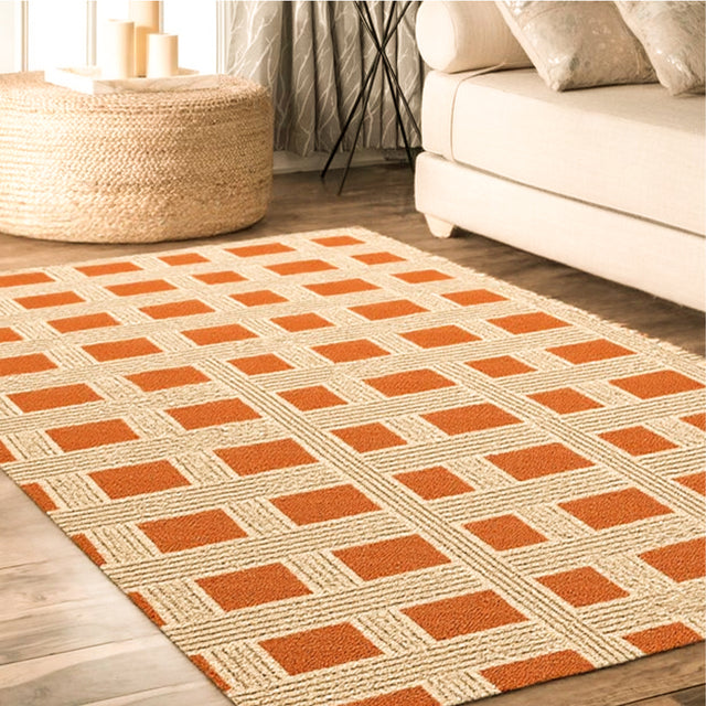 Reddish Brown Beige Geometric Grid Pattern Rug On The Floor Besides The White Sofa 091048