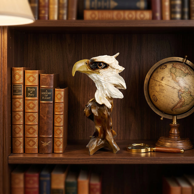Resin eagle head sculpture on classic library bookcase