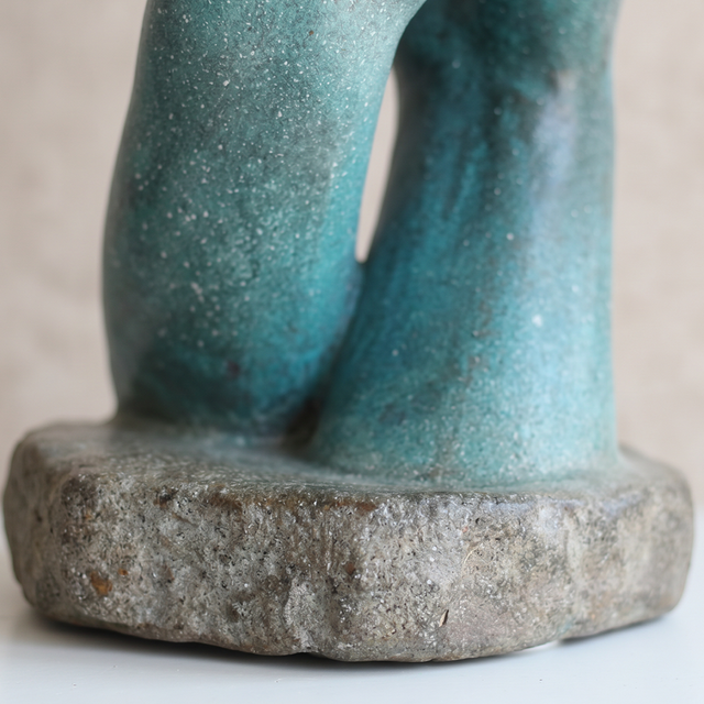 Rough stone base hand figurine detail