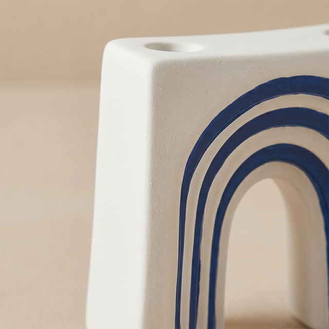 Side closeup of arch ceramic piece