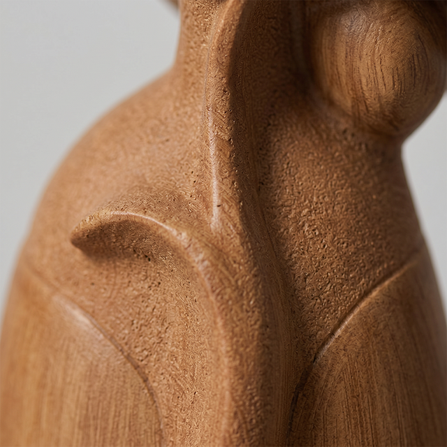Side profile abstract female bust detail shot