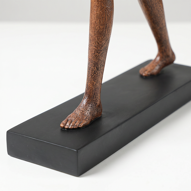 Side view bare feet and black base detail