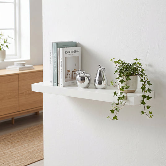 Silver Fruit Decor On White Shelf