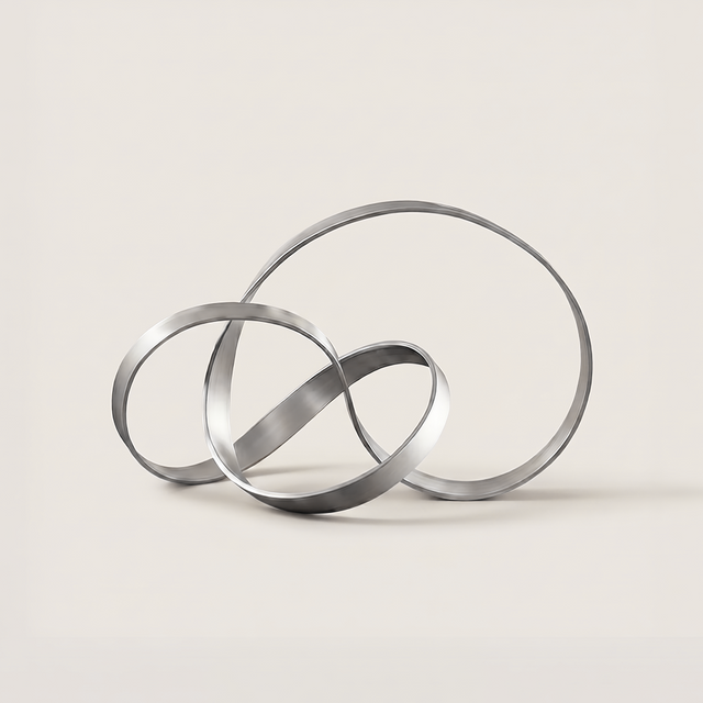 Silver intertwined loop metal abstract sculpture