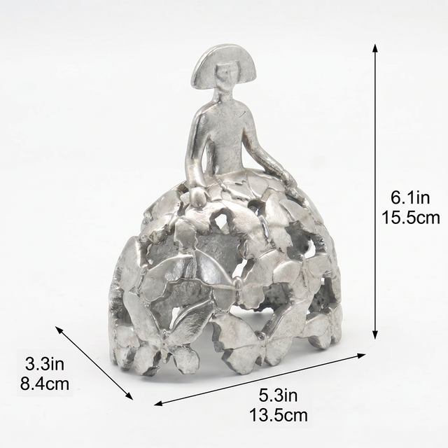 Size marked metallic female figurine