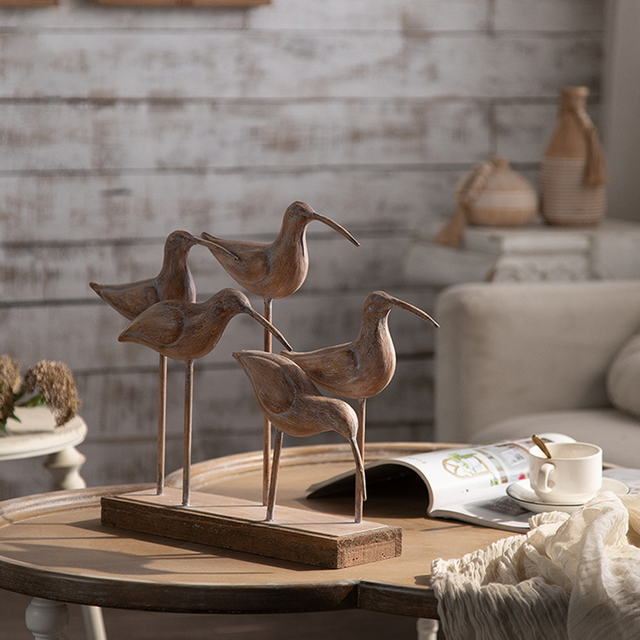 Tabletop Bird Statue Decorative Ornament on the coffee table