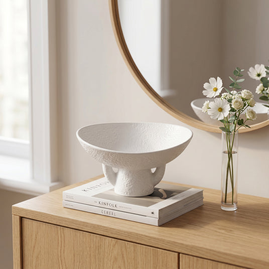 Textured Ceramic Bowl On Wooden Cabinet