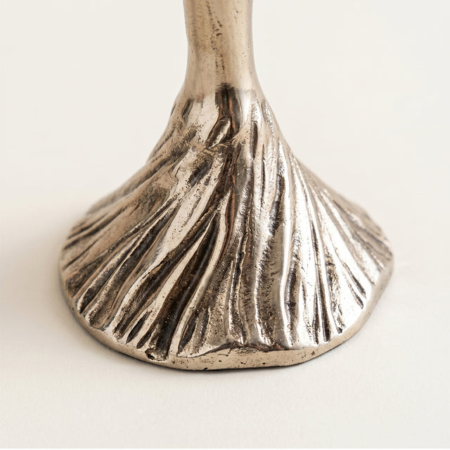 Textured flared metal base shot