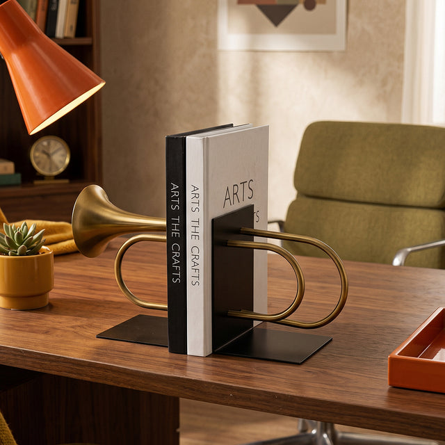 Trumpet bookends on rustic study wood desk