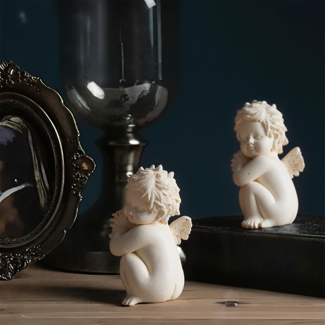 White Angel Statue Tabletop Ornaments Set on the table