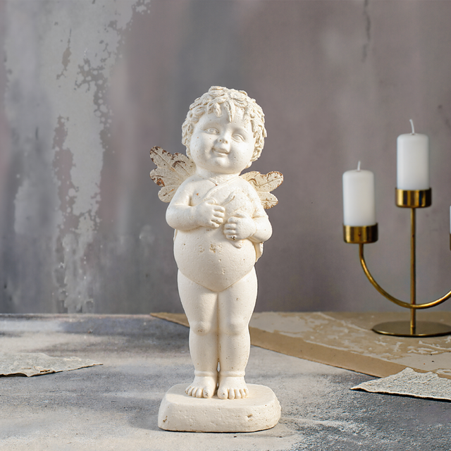 White Angel Statue Tabletop Ornaments Set on the table